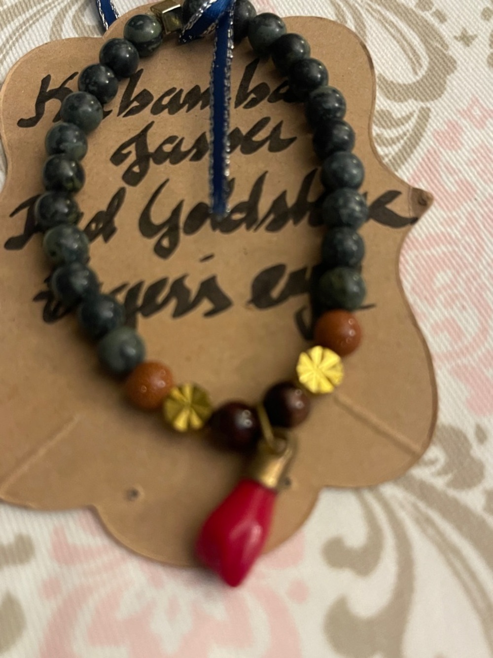 Beaded Women’s Bracelet with Red Charm